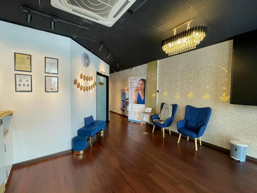 Waiting area with blue armchairs