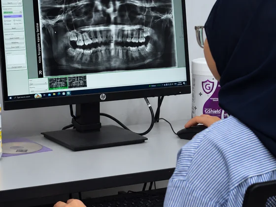 A panoramic X-ray being reviewed on screen